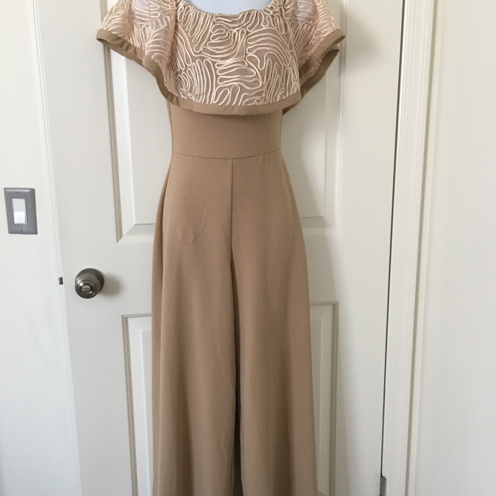 Va Va Voom. Women cream Jumpsuit. Sample model.